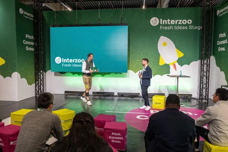 The Interzoo Fresh Ideas Stage 2026 with its rocket backdrop and audience on the cube seats